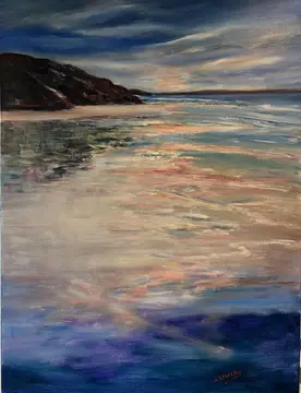 Dappled light on sea shore